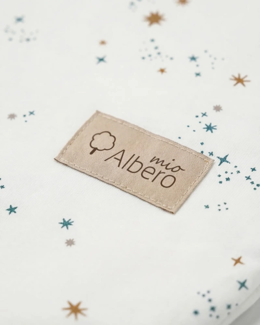 Zbliżenie na tkaninę śpiworka Albero Mio Gwiezdny pył
